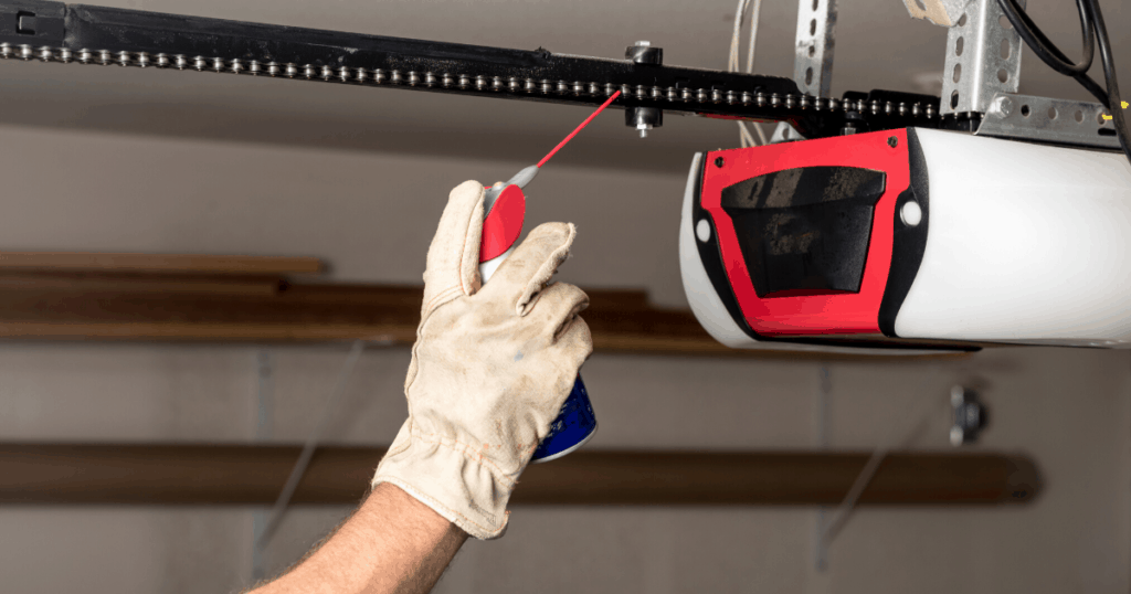 Close-up service work on a garage door opener chain